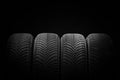 Car tires, winter wheels isolated on black background Royalty Free Stock Photo