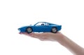 Car toy on palm Royalty Free Stock Photo