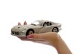 Car toy on palm Royalty Free Stock Photo