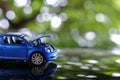 Car toy problem broken down parked with open hood of vehicle Royalty Free Stock Photo