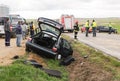 Car from a traffic accident with police, firefighters and people around. Royalty Free Stock Photo