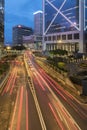 Car Traffic in central district of Hong Kong city at dusk Royalty Free Stock Photo