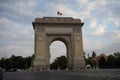 Car traffic, heavy city traffic at The Arch of Triumph junction Arcul de Triumf in Bucharest, Romania, 2021