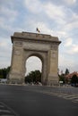 Car traffic, heavy city traffic at The Arch of Triumph junction