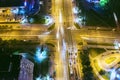 Car traffic on road intersection at night city. aerial view Royalty Free Stock Photo