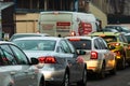 Car traffic at rush hour in downtown area of the city. Car pollution, traffic jam in the morning and evening in the capital city Royalty Free Stock Photo