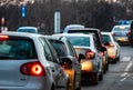 Car traffic at rush hour in downtown area of the city. Car pollution, traffic jam in the morning and evening in the capital city Royalty Free Stock Photo