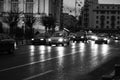 Car traffic at rush hour on the main boulevard in Bucharest downtown. Rainy morning, rainy evening during winter in Bucharest,