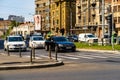 Car traffic at rush hour stopped at red light. Car pollution, traffic jam in the morning and evening in the capital city of