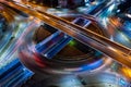 Car traffic transportation above intersection road in Bangkok city night, aerial view cityscape of advanced innovation, financial