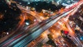 Car traffic transportation on road, bridge at junction intersection in Asia urban city, night cityscape high angle view Royalty Free Stock Photo