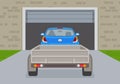 Car with a trailer entering garage. Back view. Flat vector illustration. Royalty Free Stock Photo