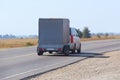 car with the trailer goes on highway Royalty Free Stock Photo