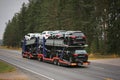 Car Transporter Truck Hauls New Cars on the Road