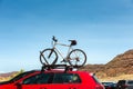 Car is transporting bicycle on the roof. Royalty Free Stock Photo