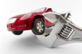 Car trapped by monkey wrench Royalty Free Stock Photo