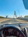 car travel driving car by Budapest modern bridge