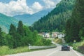 car travel road through small town in mountains Royalty Free Stock Photo