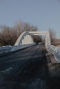 Car traveling on the one-way Rainbow Bridge on Route 66 near Chetopa, Kansas, Royalty Free Stock Photo