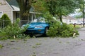 Car and Tree Limbs Storm Damage Royalty Free Stock Photo