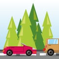 Car and truck over rood with forestal landscape Royalty Free Stock Photo