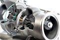 Car turbocharger showing inside, isolated on white background