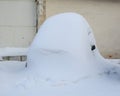 Car turned into a snowdrift covered with snow Royalty Free Stock Photo