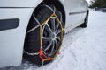 Car with tyre chains in winter Royalty Free Stock Photo