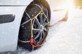 Car with tyre chains in winter Royalty Free Stock Photo