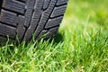 Car tyre on the green grass