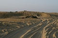 Car tyre marks on sand dunes, Thar desert, Rajasthan, India. Tourists arrive on cars to watch sun rise at desert , a very Royalty Free Stock Photo