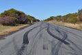 Car tyre tire skid marks on urban asphalt road