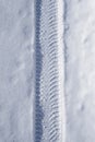 Car tyre track in snow Royalty Free Stock Photo