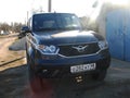 car UAZ Patriot gray color outdoor the sun