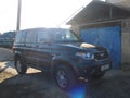 car UAZ Patriot gray color outdoor the sun