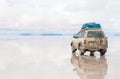 Car on the Uyuni Salar in Bolivia Royalty Free Stock Photo