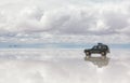 Car on the Uyuni Salar in Bolivia Royalty Free Stock Photo