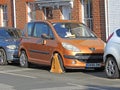 Car vehicle clamped wheel clamp illegal road park parking cars autos tax police notice