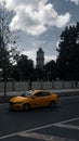 Car vehicle taxi street urban tree architecture clock tower