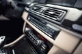 Car ventilation system and air conditioning - details and controls of car. Concept wallpaper with minimalist industrial des