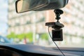 Car video camera dash cam inside of car on highway with blurred background of highway road, from perspective of the driver. Conc Royalty Free Stock Photo