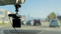 Car video camera dash cam inside of car on highway with blurred background of highway road, from perspective of the driver. Conc Royalty Free Stock Photo