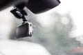 Car video recorder installed on front window, close up photo Royalty Free Stock Photo