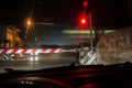 Car Waiting in front of a Rail Crossing Royalty Free Stock Photo