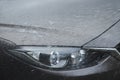 Car wash business banner concept. Cleaning and Spray water Washing front headlight of the car. Royalty Free Stock Photo