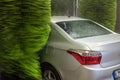 Car wash. Cleaning high-pressure water cars and foam in the washing station Royalty Free Stock Photo