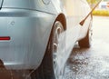 Car wash day. Cleaning the sporty rims Royalty Free Stock Photo