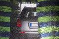 Back of grey car during washing process Royalty Free Stock Photo