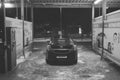 car wash with Opel Astra in Chomutov in Czechia on 16. January 2024 on black and white film photo - blurriness and noise of