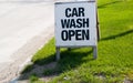 Car Wash Open Sign on Curb